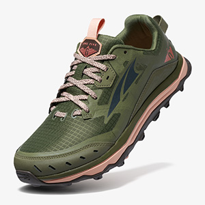Studio lit Altra Lone peak sneakers in a green colorway with the heel raised.